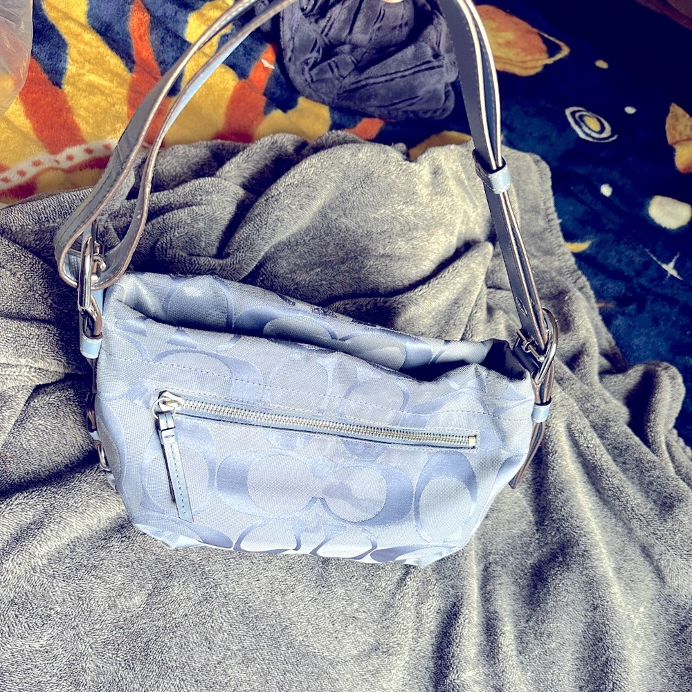 Soft blue Coach signature bag